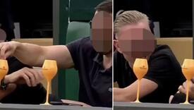 Navijač na Wimbledonu snimljen kako čovjeku do sebe ubacuje prah u piće, prikazano na TV-u